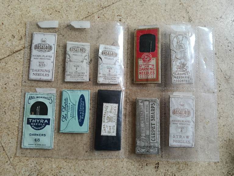 Antique needle packet holders and cotton reels