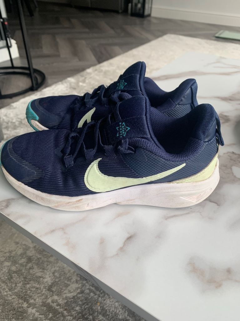 Boys navy Nike trainers size 2.5 
