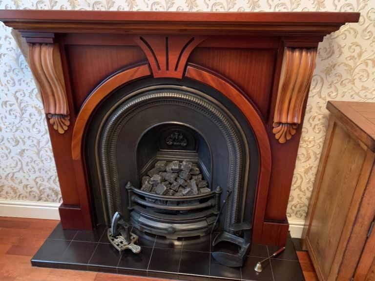 Cast iron gas fire and surround