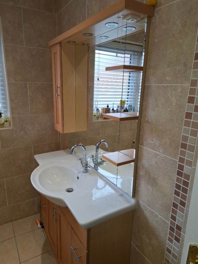 A two part bathroom vanity unit 
Base Unit