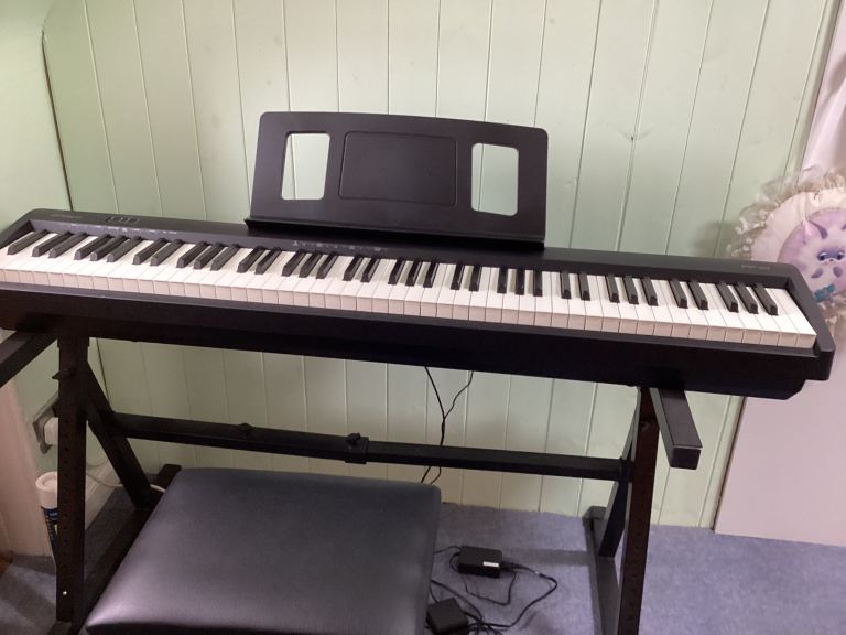 Roland FP10 digital piano with stand and stool