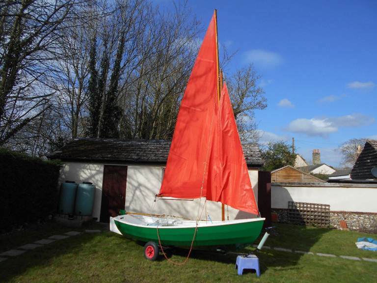 Small Sailing Dinghy with Red Sail – Good Condition