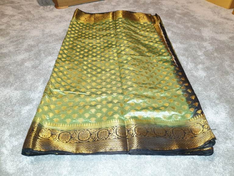 Green and Black Saree and Blouse with floral patterns