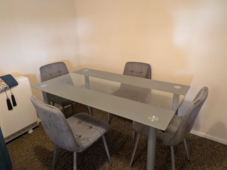 brand new Wayfair  dining table  with four chairs 