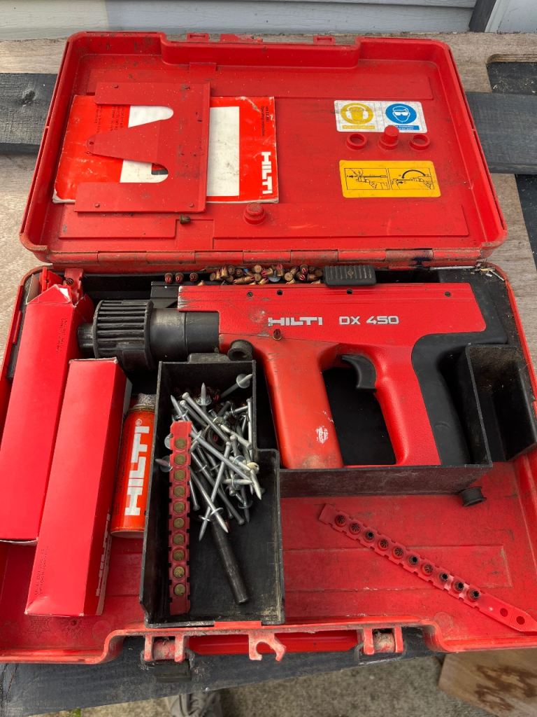 Hilti DX 450 Powder-Actuated Fastening Tool with Case, Nails & Cartridges