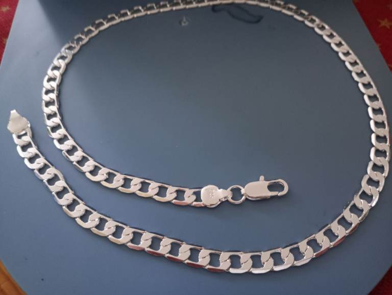 25 grams sterling silver plated chain weight 25 grams length 22 inches width 8 mm