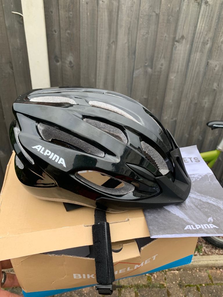 Alpina gents bicycle helmet. Brand new boxed. Never worn.