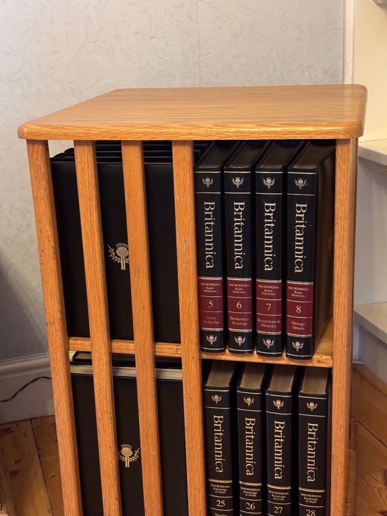 Encyclopaedia Britannica plus rotating bookshelf 