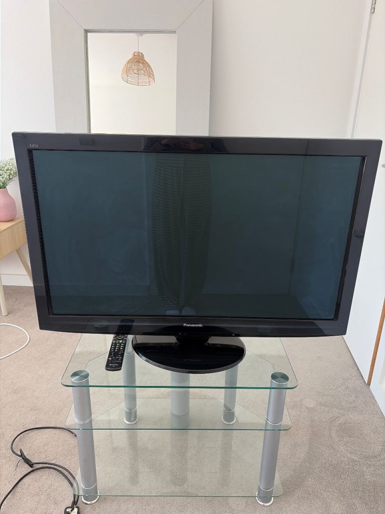 Panasonic 42’ TV & Glass TV Stand – Good Condition