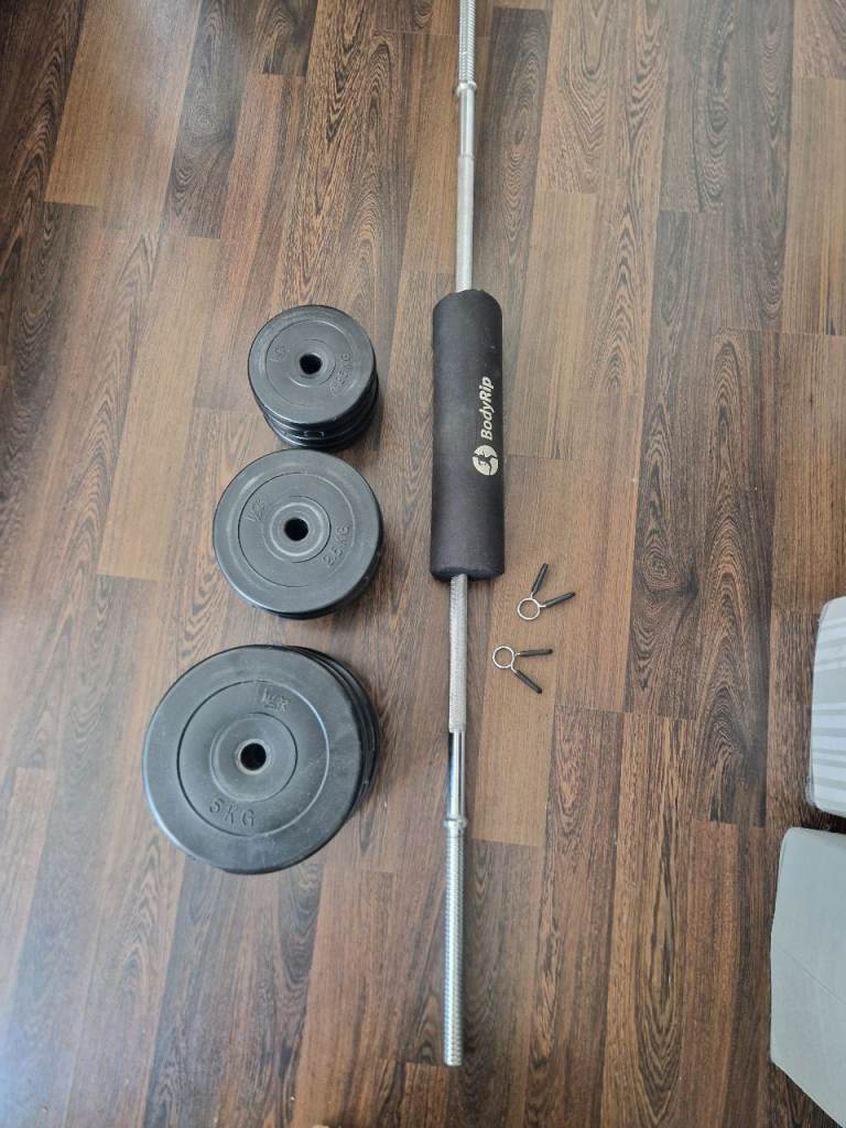 Barbell, weights and barbell pad