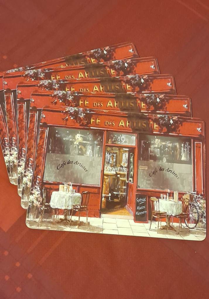 Five Multicoloured Cafe des Artistes Table Mats/Coasters.