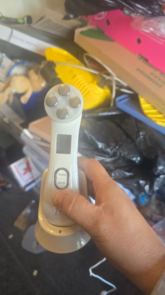 Facial Massager Device with Charging Dock – Good Condition