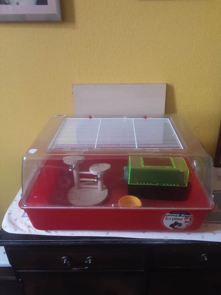 Hamster  ferplast cage with accessories  .Metal  top opens  up for easy  cleaning. 