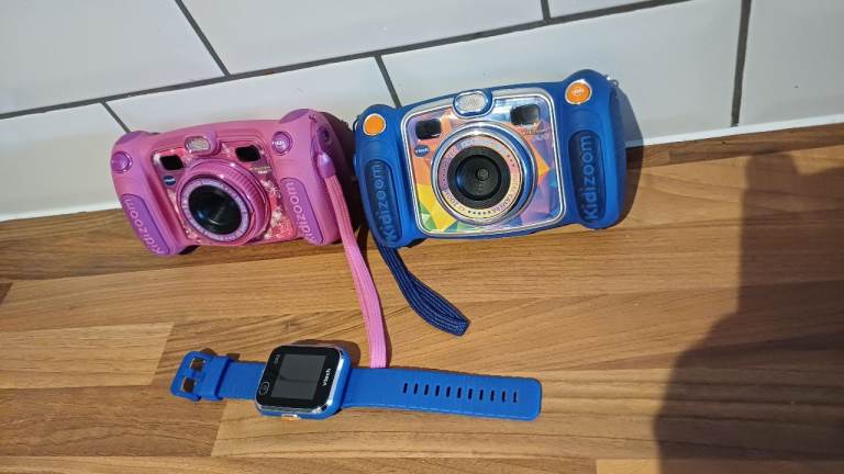 Vtech His & Her Cameras and a Watch