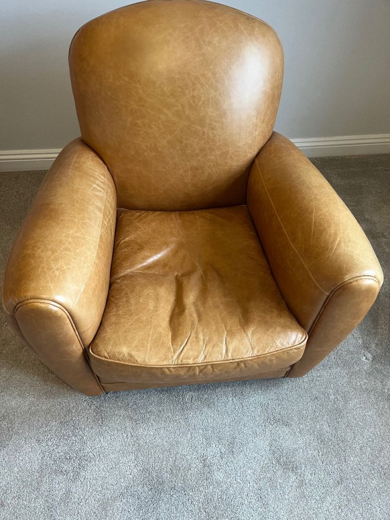 Tan leather armchair