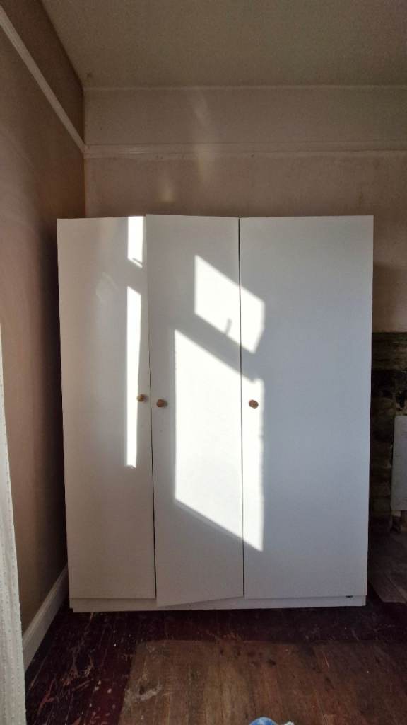 IKEA wardrobe (well used. Could be reassembled or materials used for DIY)