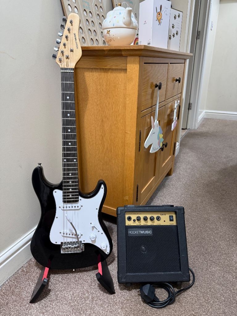Rocket Music Electric Guitar, Amplifier & Stand 