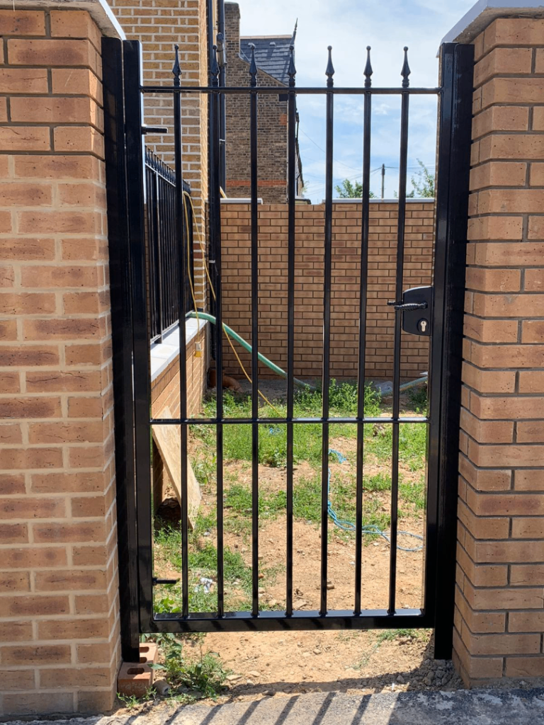 Steel metal garden gate, vertical bars