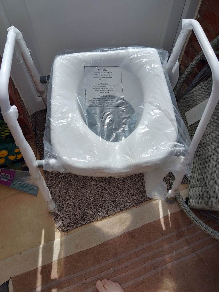 Disability aid - toilet frame with seat