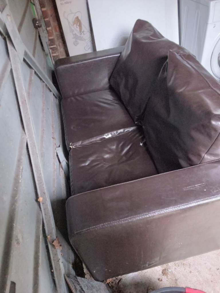 Brown Leather Two-Seater Sofa – Fair Condition