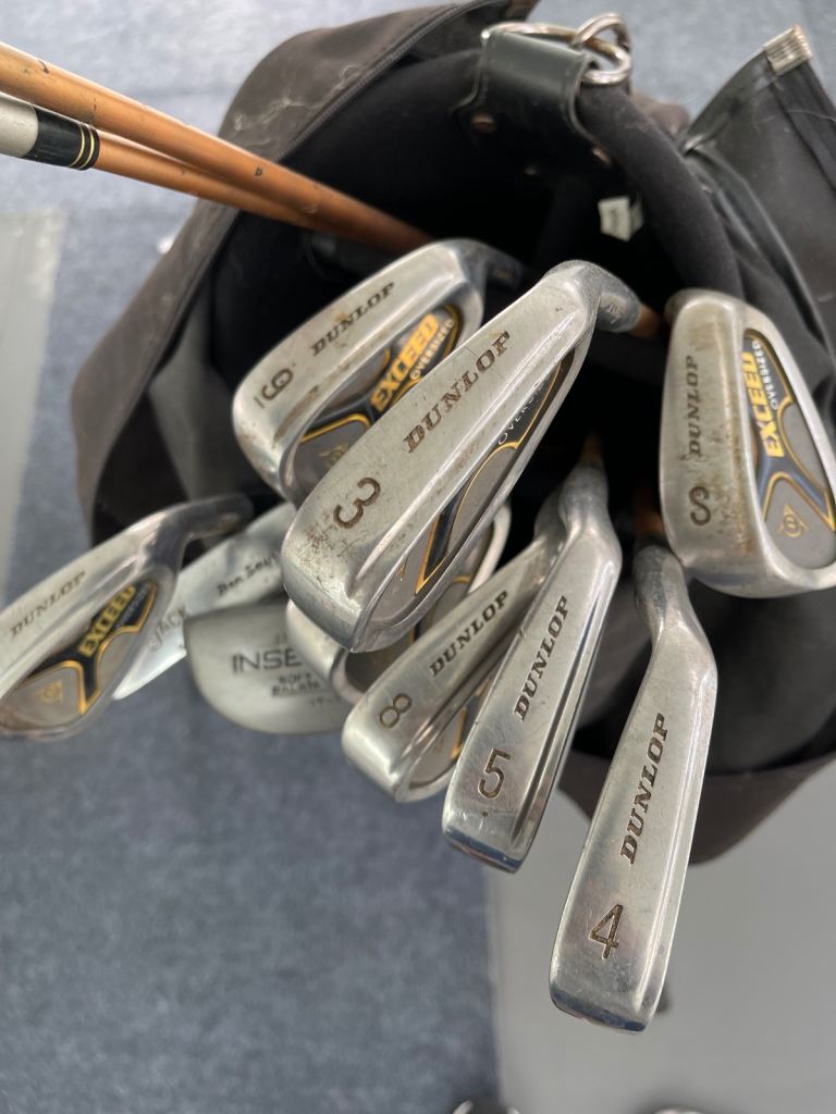 Dunlop golf bag clubs and some balls carbon fibre 