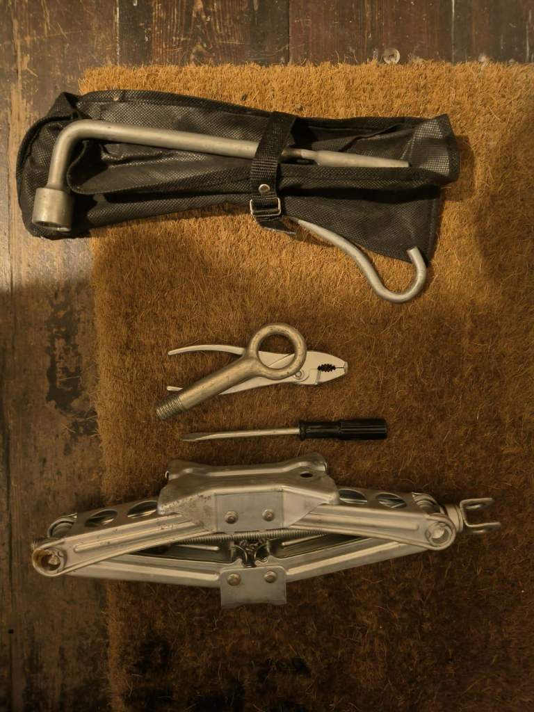 Car tools from Honda civic including jack, spanner etc