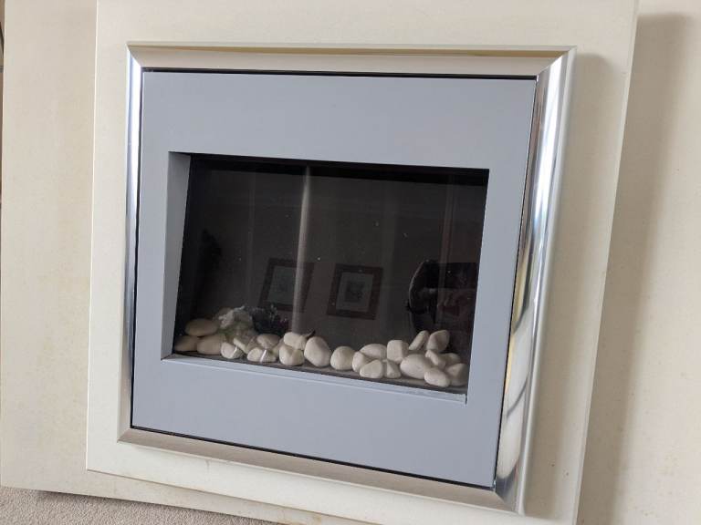 Flamerite Fires Landscape wall mounted electric fire with a cream surround