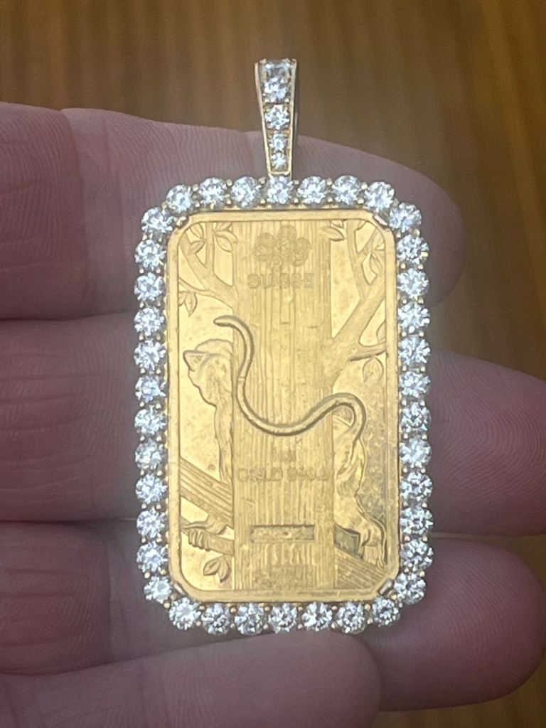 24 carat gold pendant