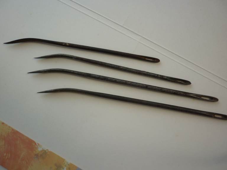 FIVE  Very Sharp tipped sail makers needles. I found a fifth after the photo was taken. 