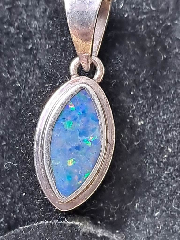 Opal stone set in Siver frame and silver chain 