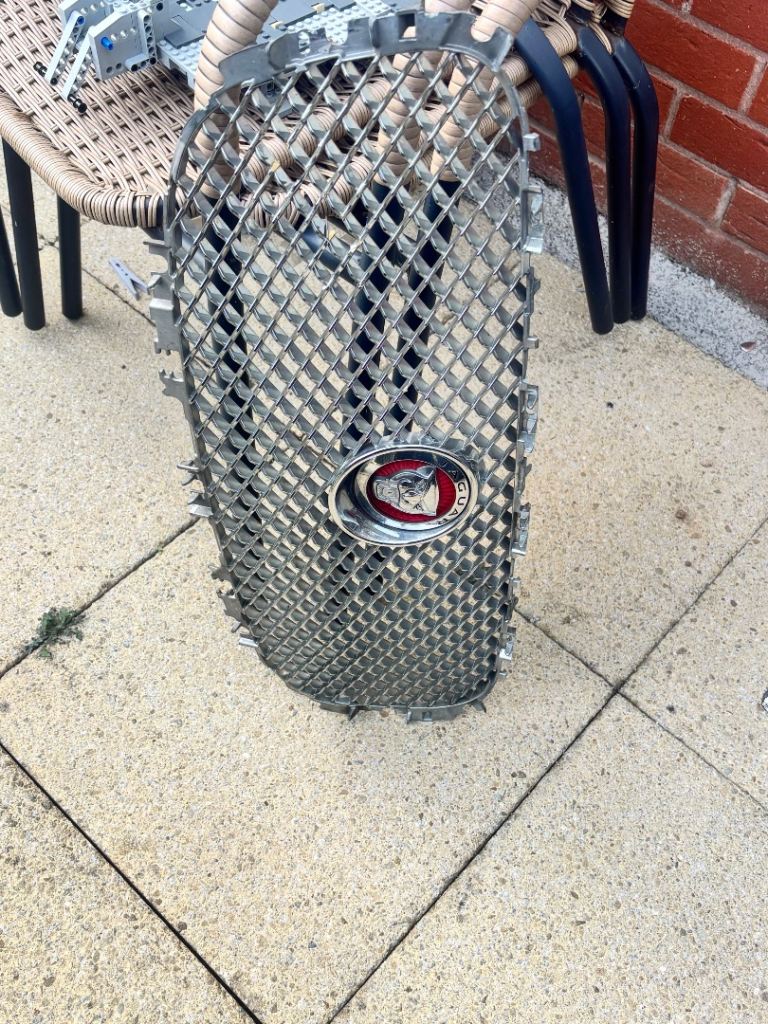 Jaguar XF front grille. Does have some damage 
