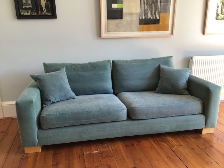 Stylish sofa in washable cotton fabric, seats 3.