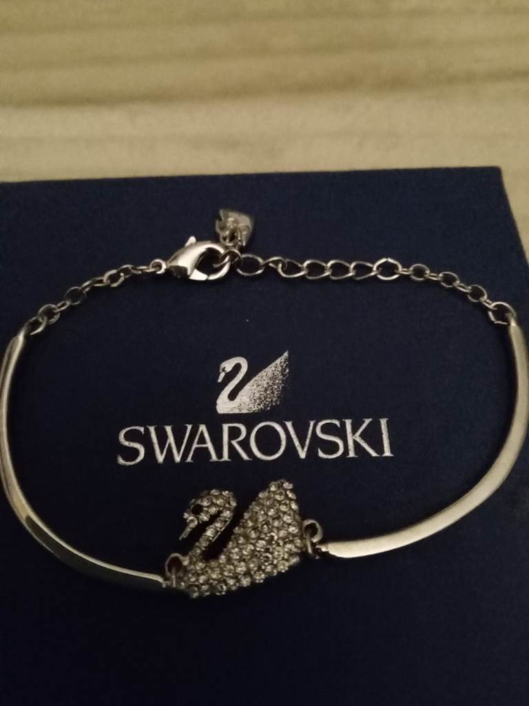 NEW SWAROVSKI RHODIUM PLATED BRACELET WITH CLEAR CRYSTAL PAVE. 