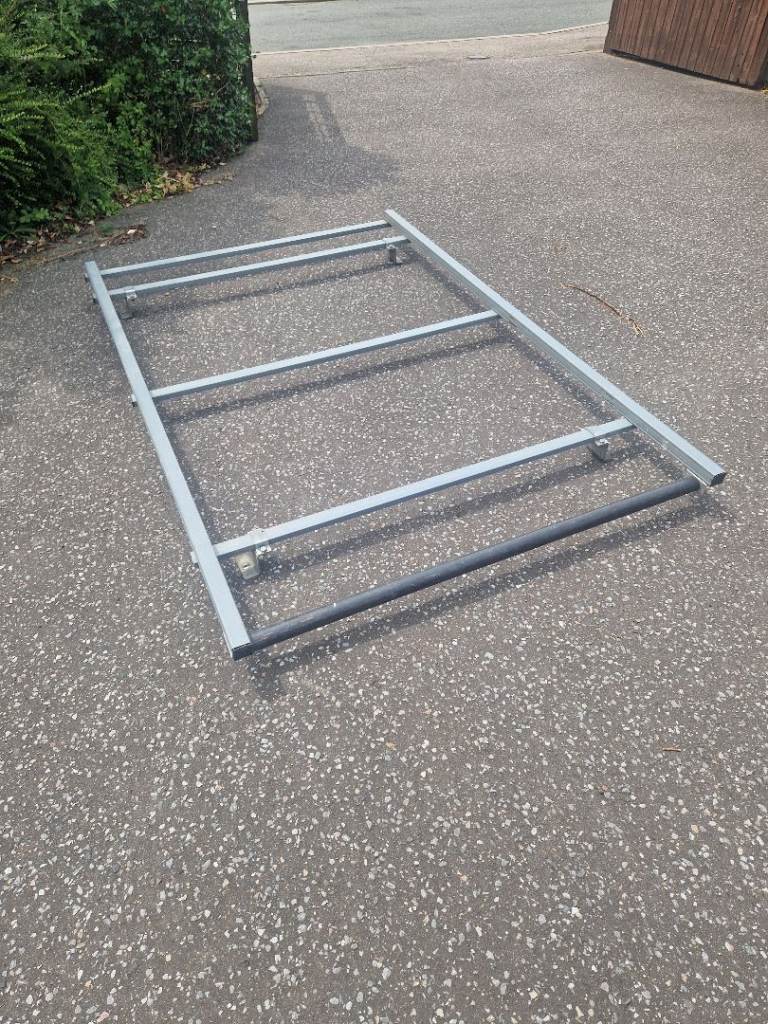 Price drop. Trident roof rack with roller load