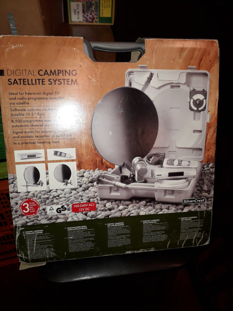 Suitcase Satellite TV with extras for camping or vehicle use. 
