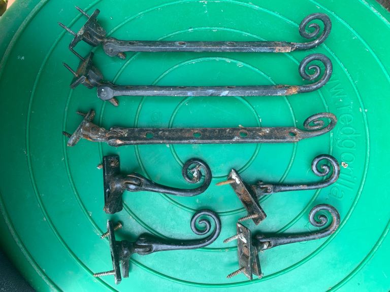 Cast iron wood frame window fixings