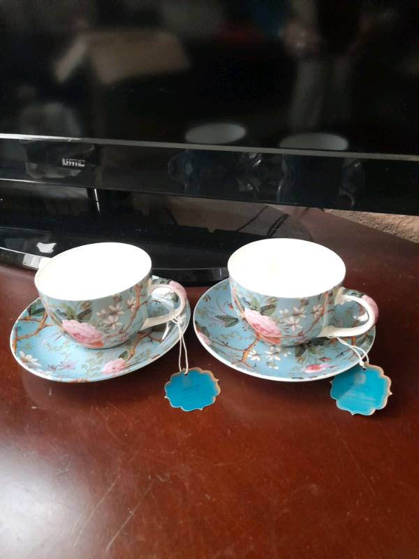 Victorian garden design cups and saucers set.