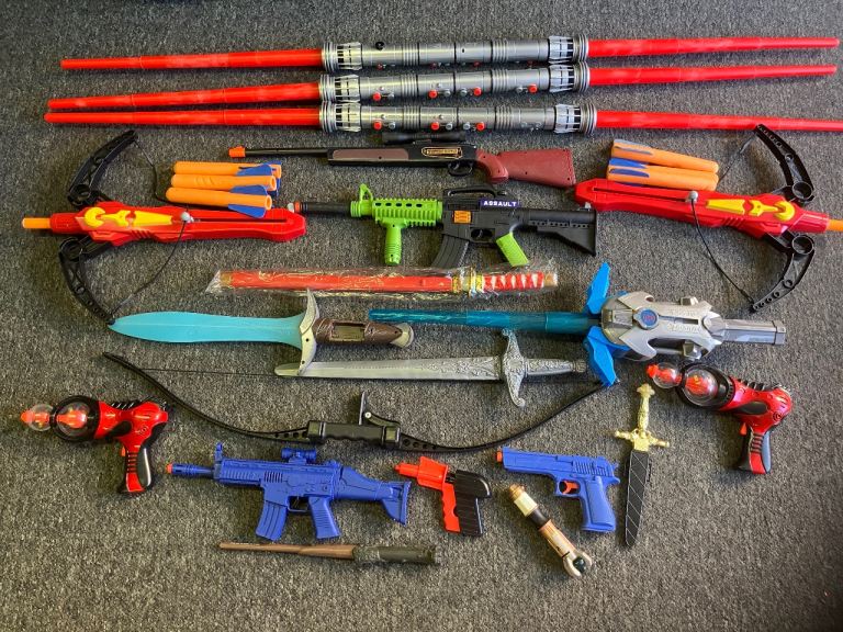 Large Bundle of Kids Toy Guns, Swords, and Bows – Good Condition