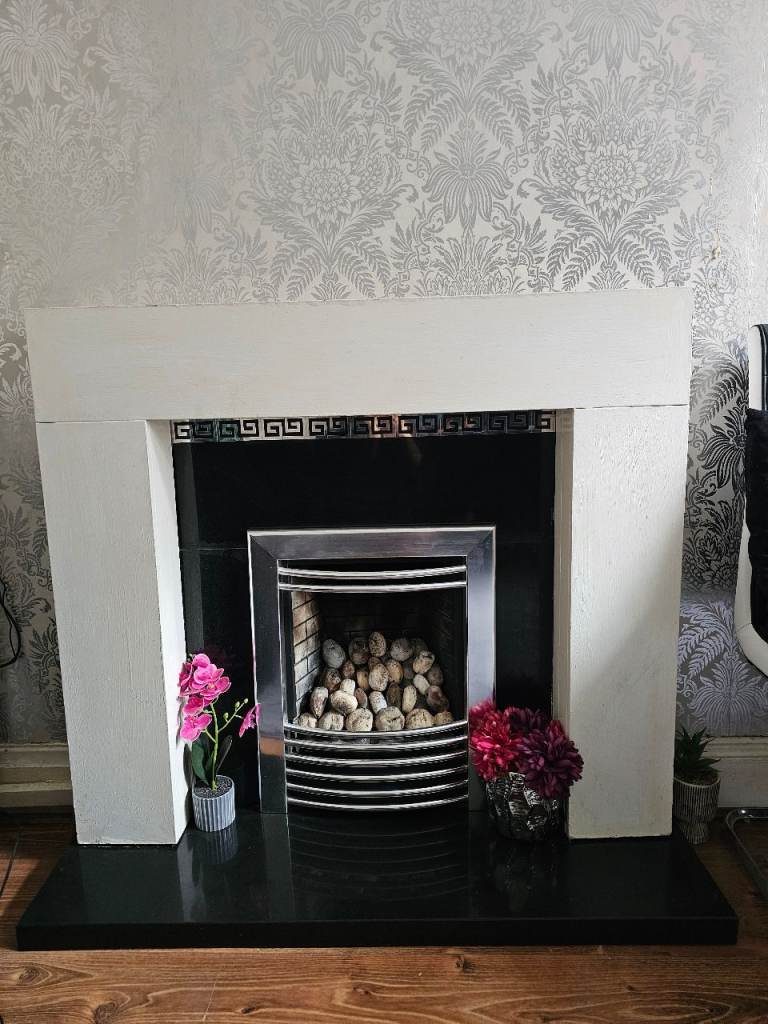 Gas fire with fireplace