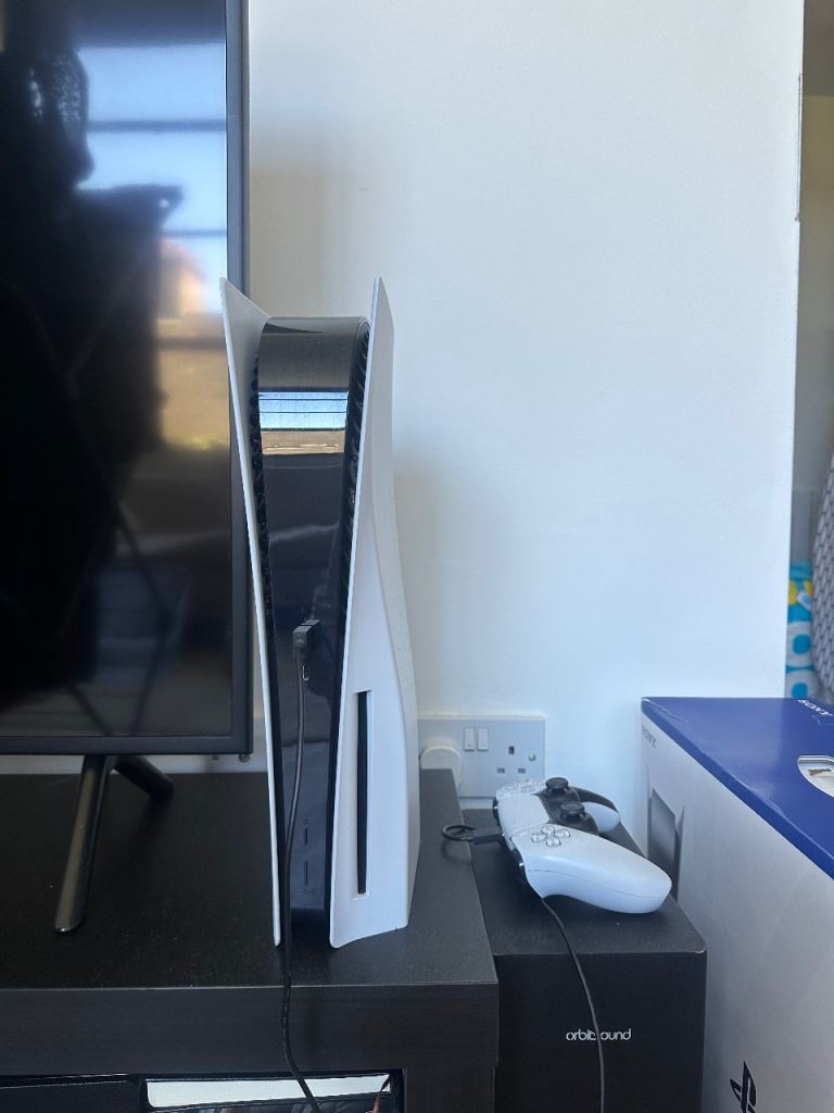 Sony PlayStation 5 (PS5) with controller