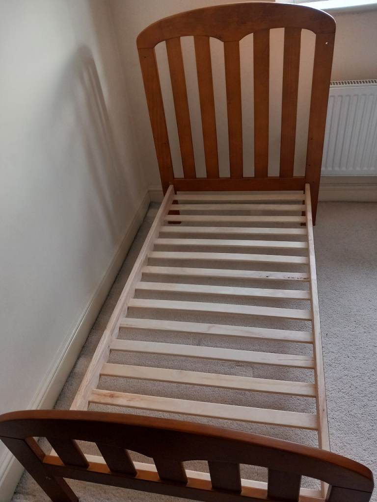 John Lewis Rachel Cot or converts to a toddler bed.  