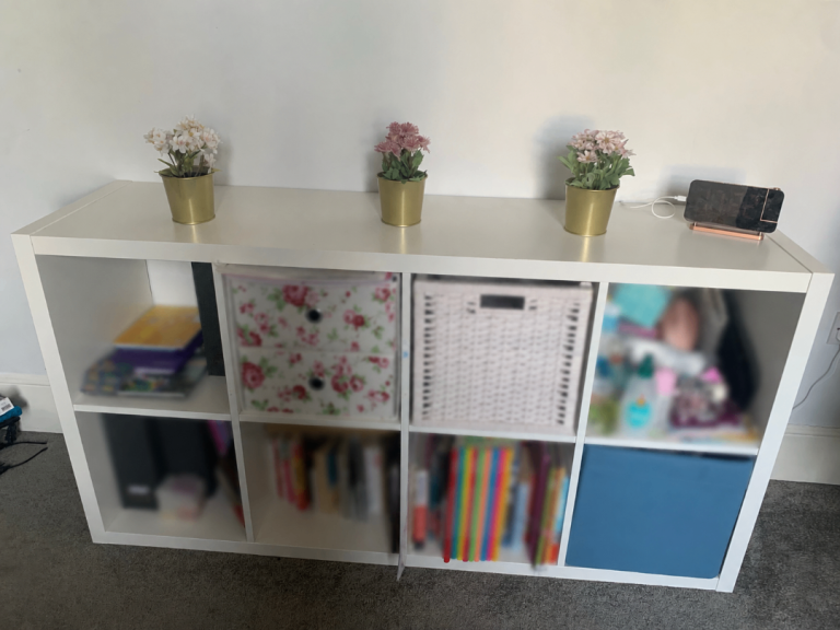 White Ikea Kallax bookshelves 4x2