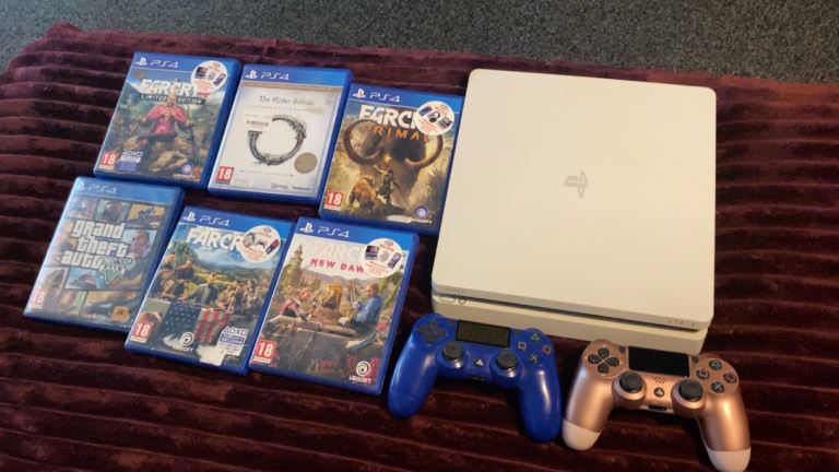 Sony PlayStation 4 Console with 2 Controllers and 6 Games