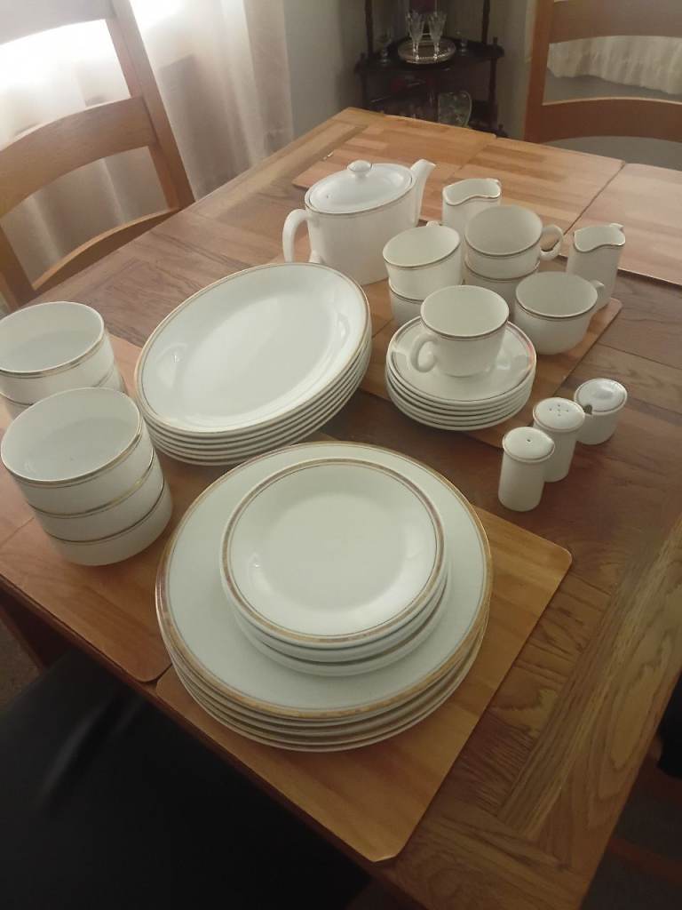 Lovely White Dinnerware Set with Gold Trim