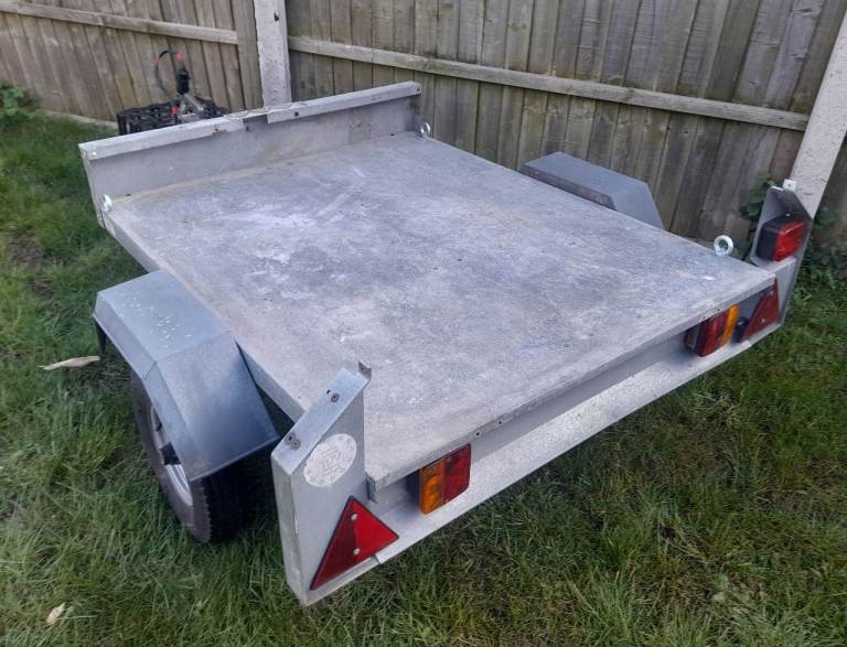 Flatbed Trailer Erde With Manual Tilt And Tie Downs
