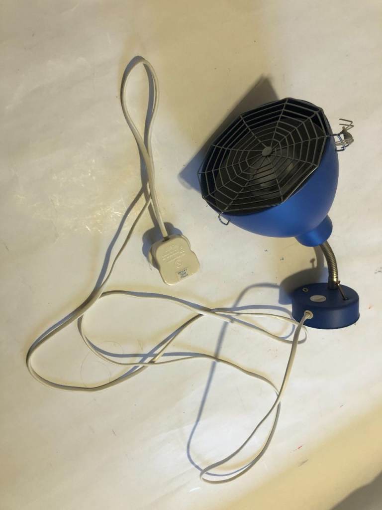 Good condition blue wall light with a fun spider design.