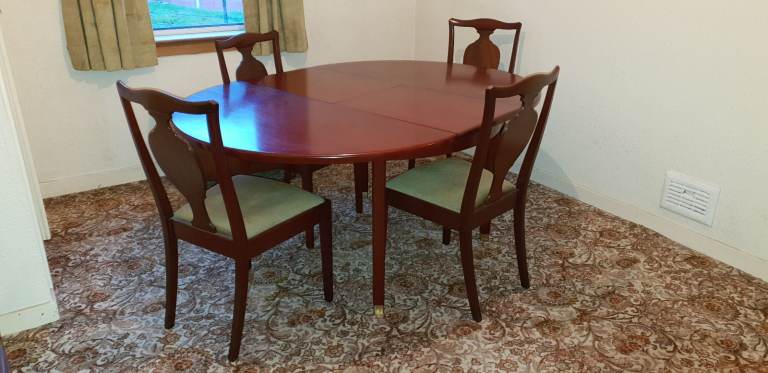 G Plan extending solid mahogany dining table