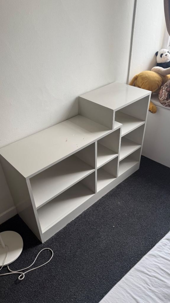Book case/lounge table with standing lights