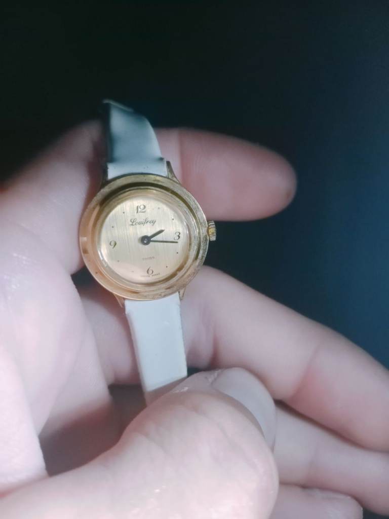 Ladies Vintage Gold Tone Wristwatch with White Strap
