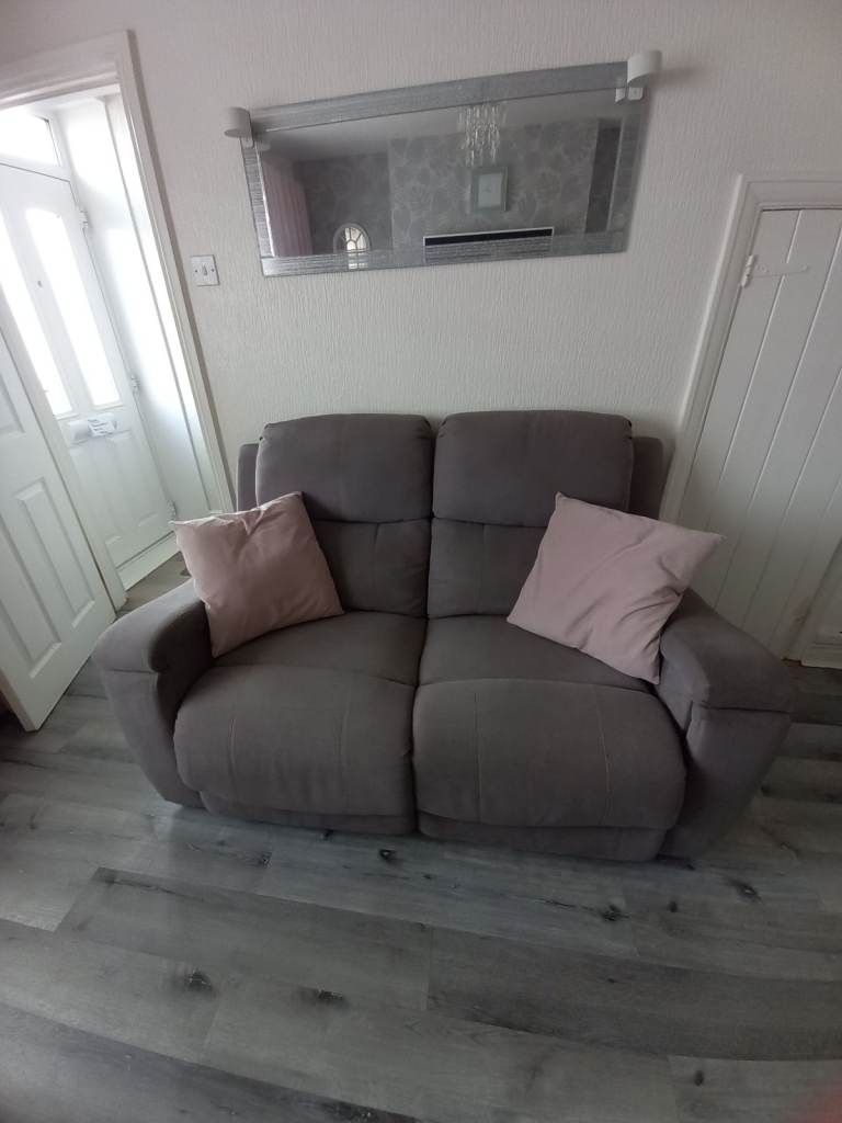 Two 2 seater recliner sofas grey